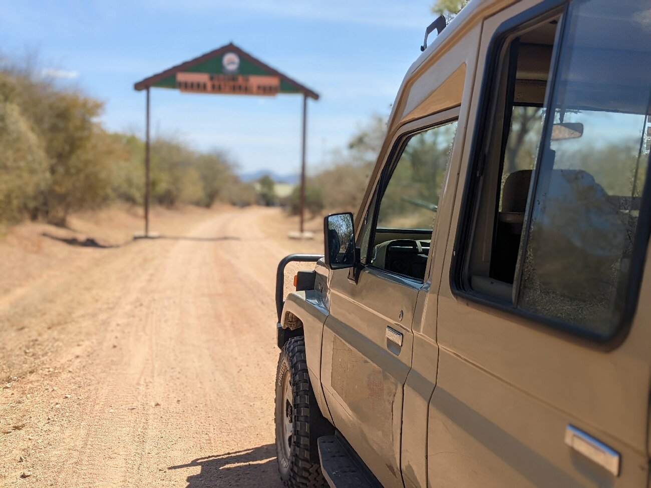 Safari vehicle at the park entrance gate, Ruaha National Park
